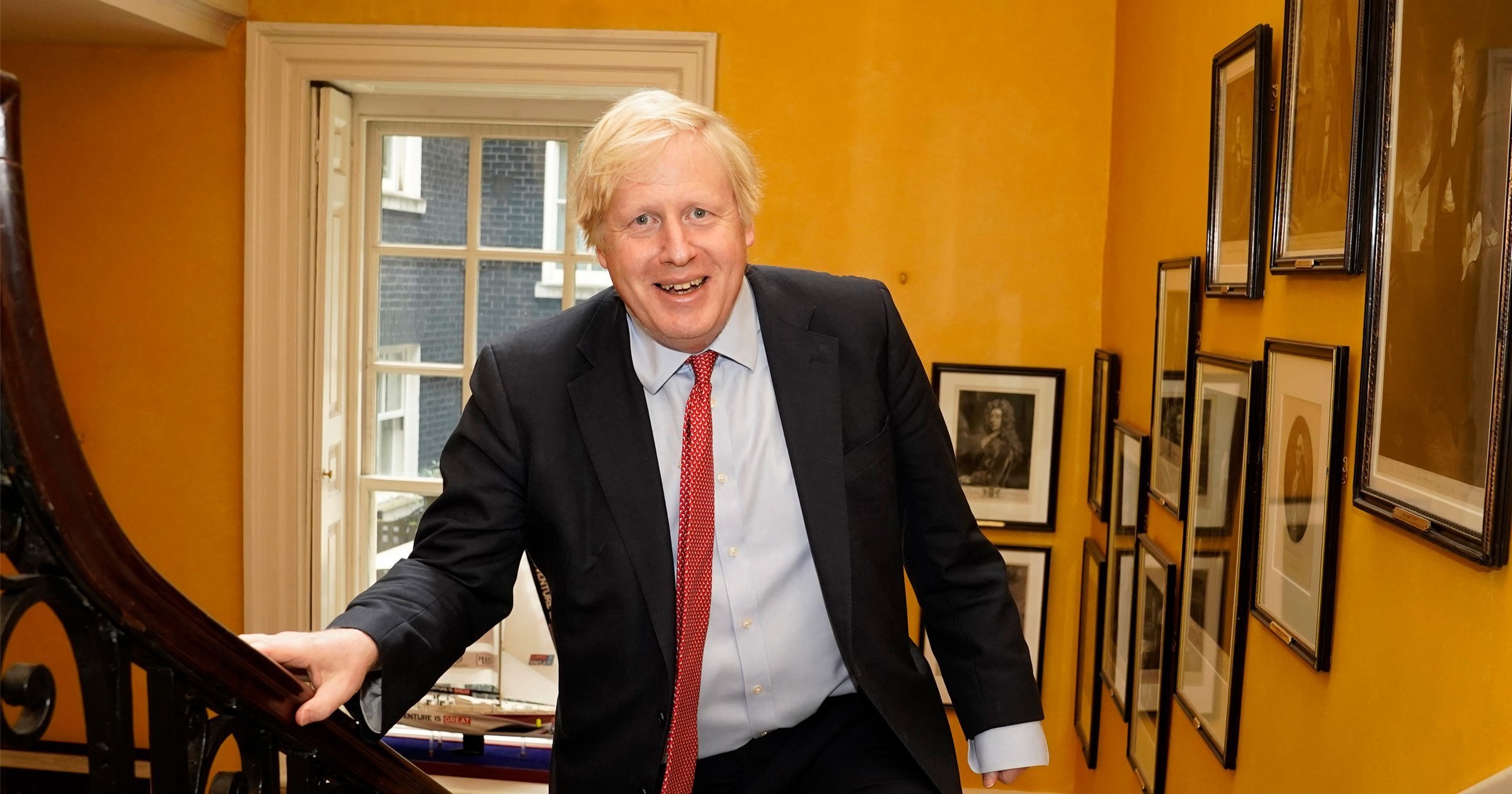 Beaming Boris Johnson returns to Downing Street after birth of son