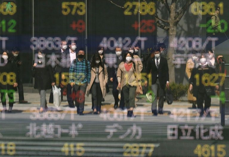 Japan passes $240 billion virus package including cash handouts