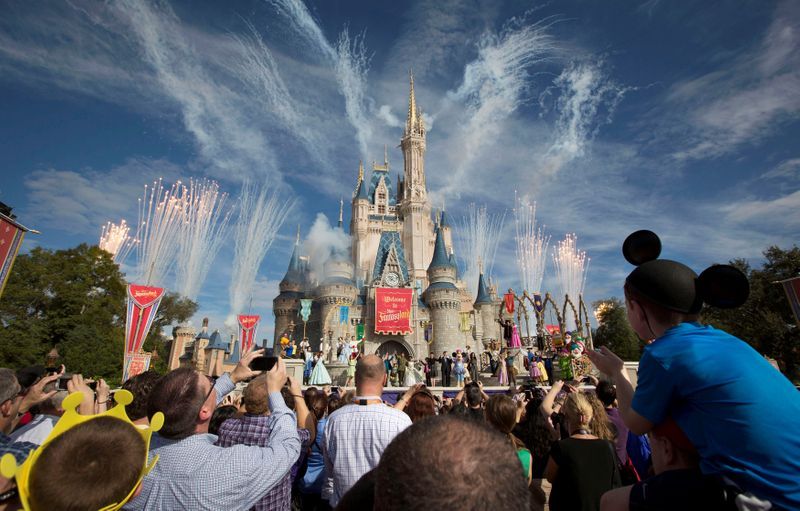 Long lines, lots of kids, and plenty to touch: how does disney reopen its parks?
