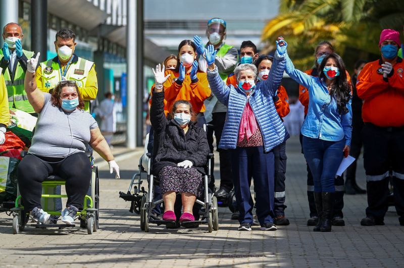 Spaniards to stroll out of lockdown as temporary hospital, symbol of pandemic battle, closes