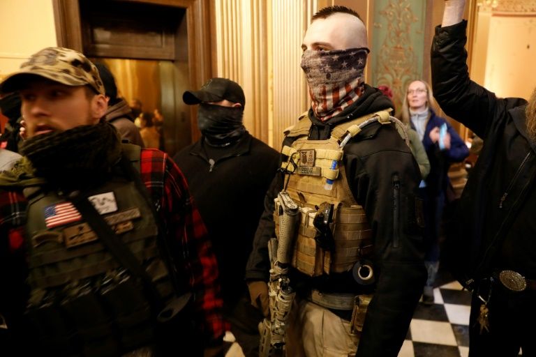 Armed US protesters enter michigan capitol to demand lockdown end