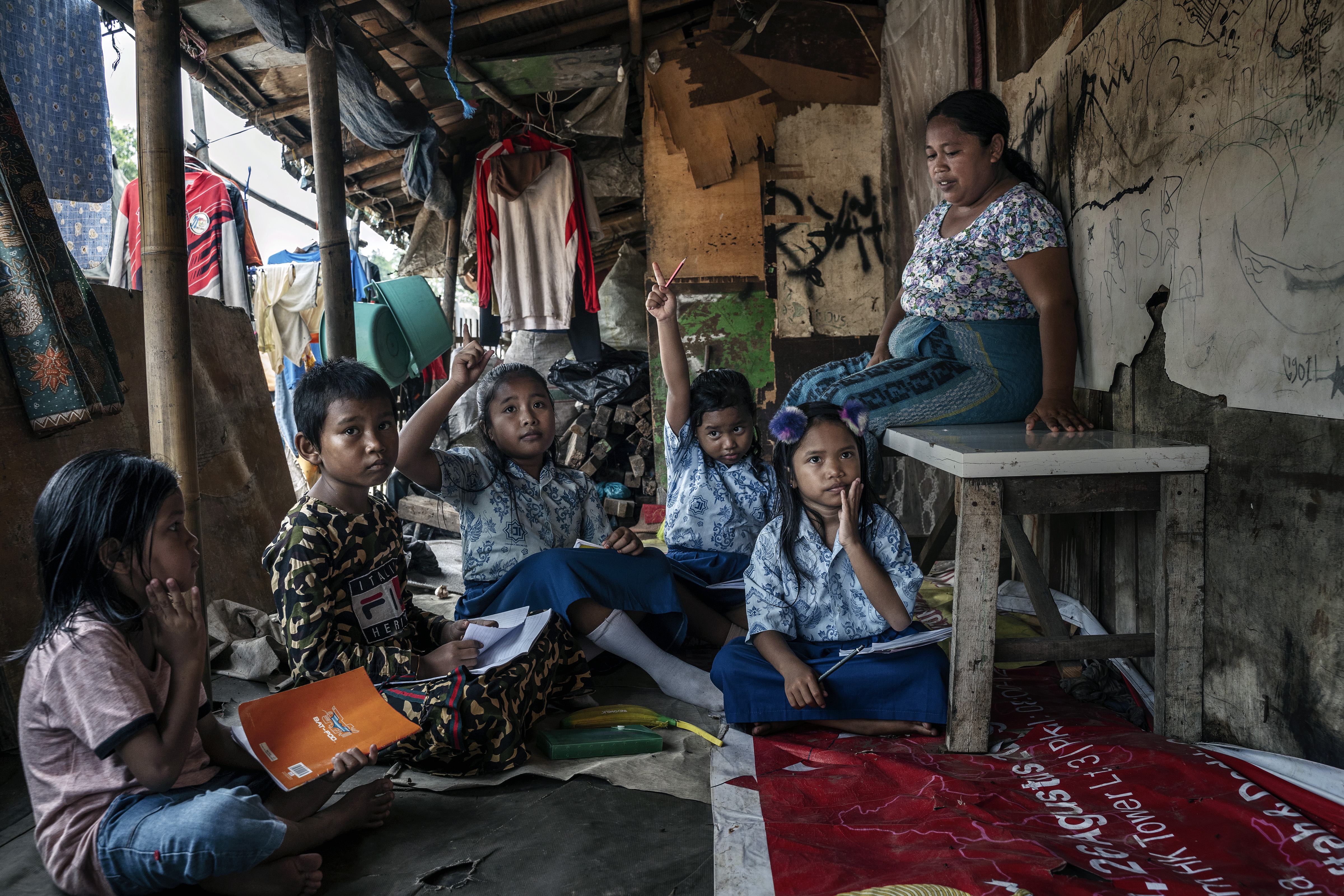 Jakarta’s trash mountain: ‘When people are desperate for jobs, they come here’