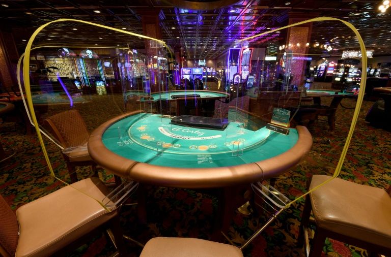 Las vegas torn by virus as casinos clamor to reopen