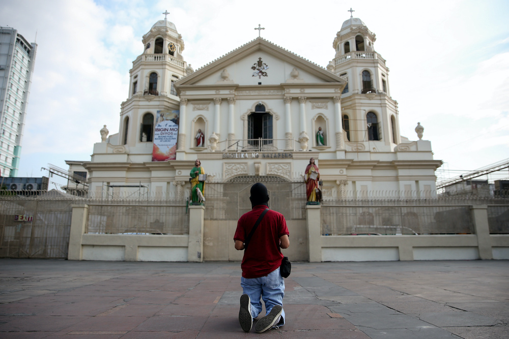 Philippines shuts churches, curbs travel as Covid-19 surges