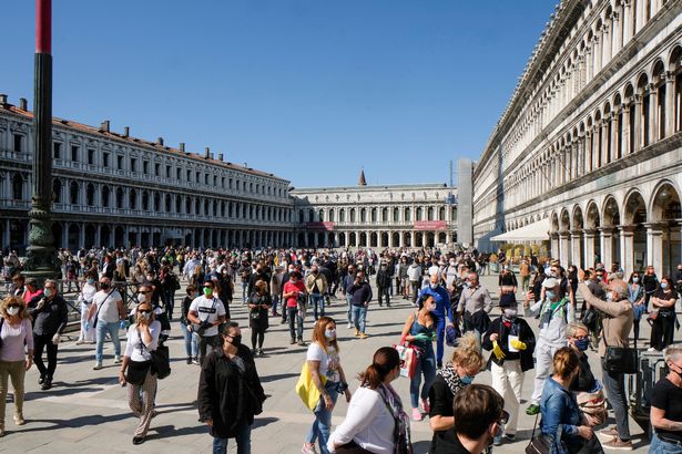 Italians flock to parks as country eases coronavirus lockdown after two months
