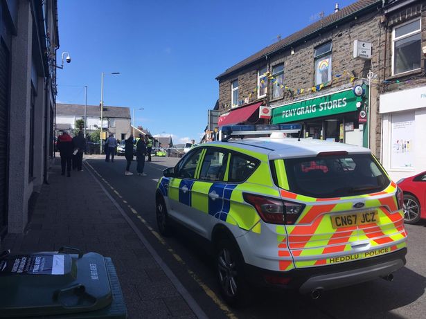 Woman 'knifes man to death in multiple stabbing at village Co-op'