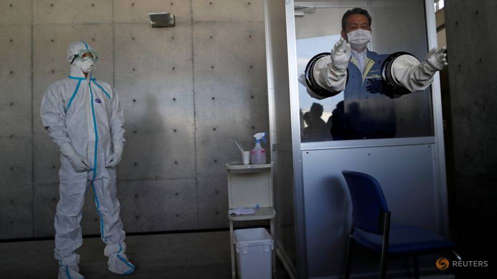 Japan lowers bar to COVID-19 testing, drops temperature guideline