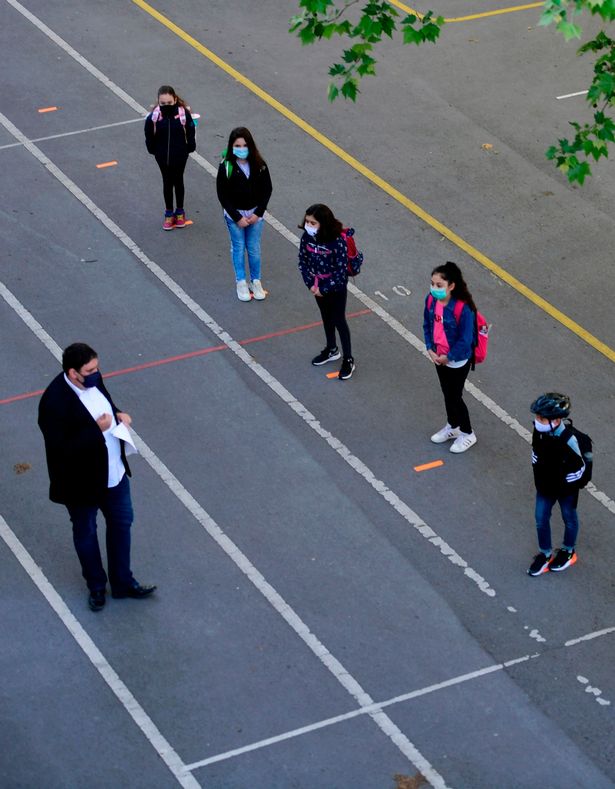 Coronavirus: German schools return as pupils taught social distancing in playgrounds