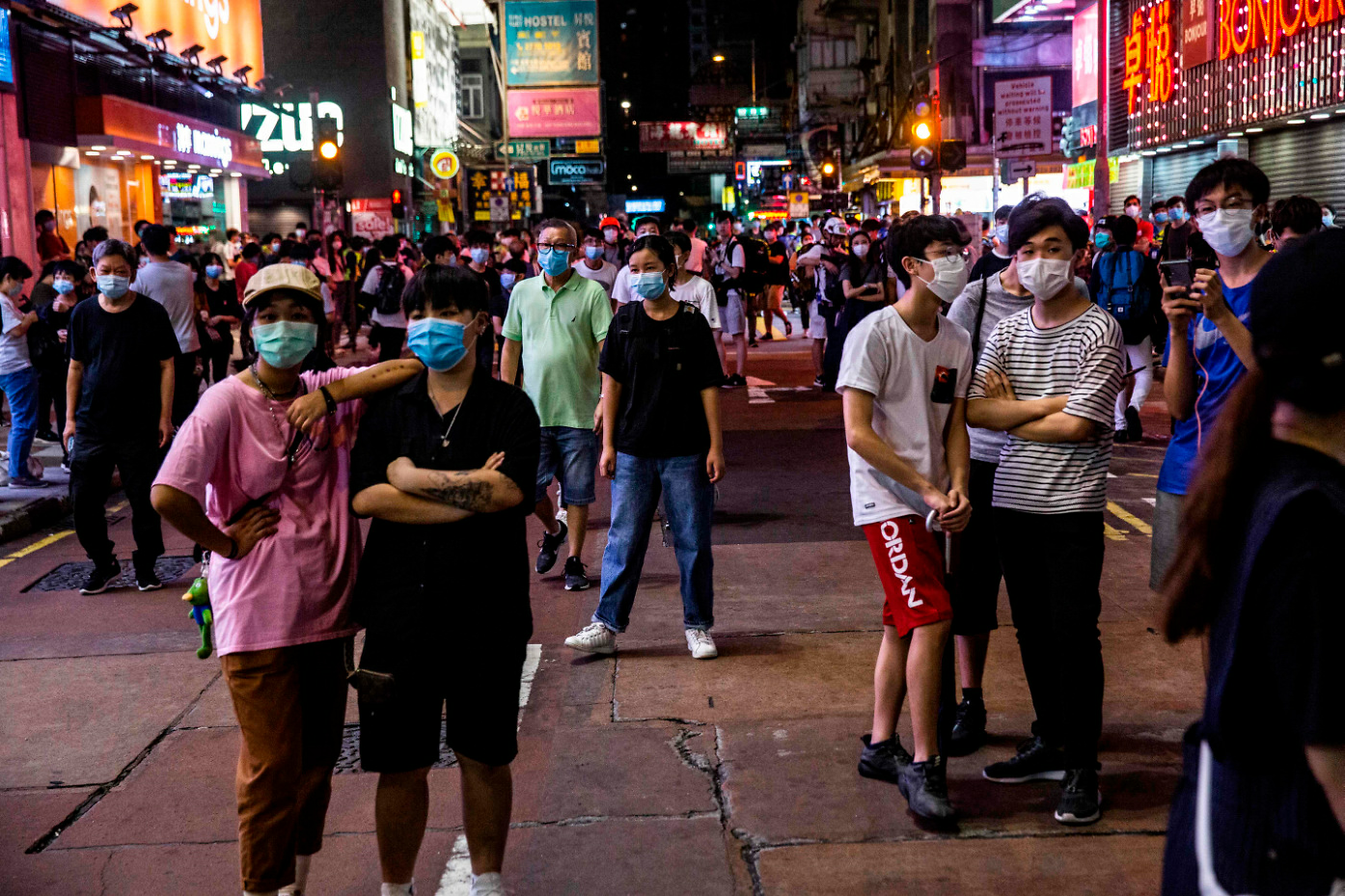 Hong Kong police arrest more than 200 as protests return