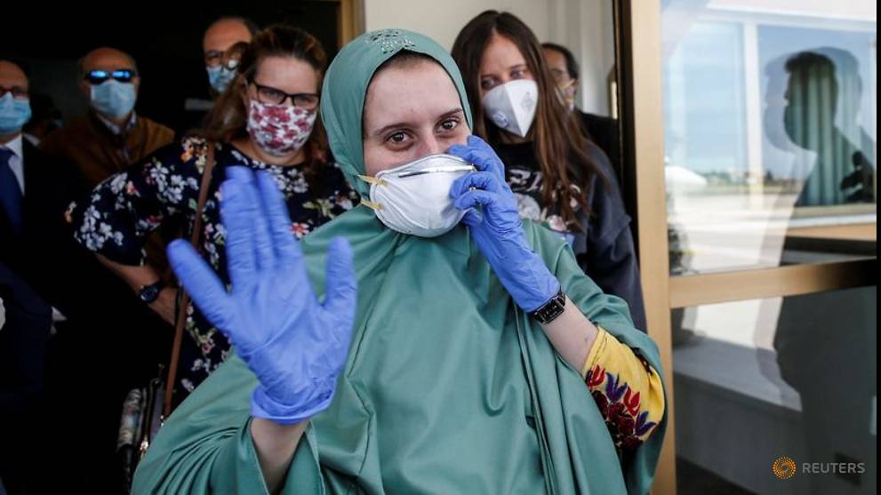 Freed Italian aid worker returns home on special flight