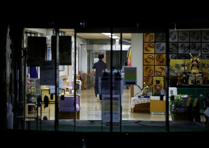 In Japan's elder-care homes, coronavirus tests limits of overstretched staff