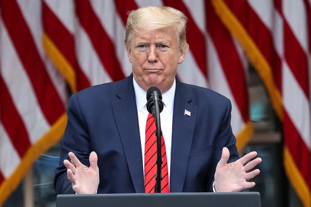 Trump tells Asian journalist to 'ask China' why people are dying before storming off