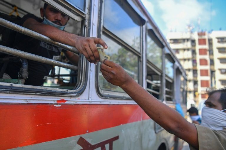 Some Indian trains to roll again despite virus cases surge