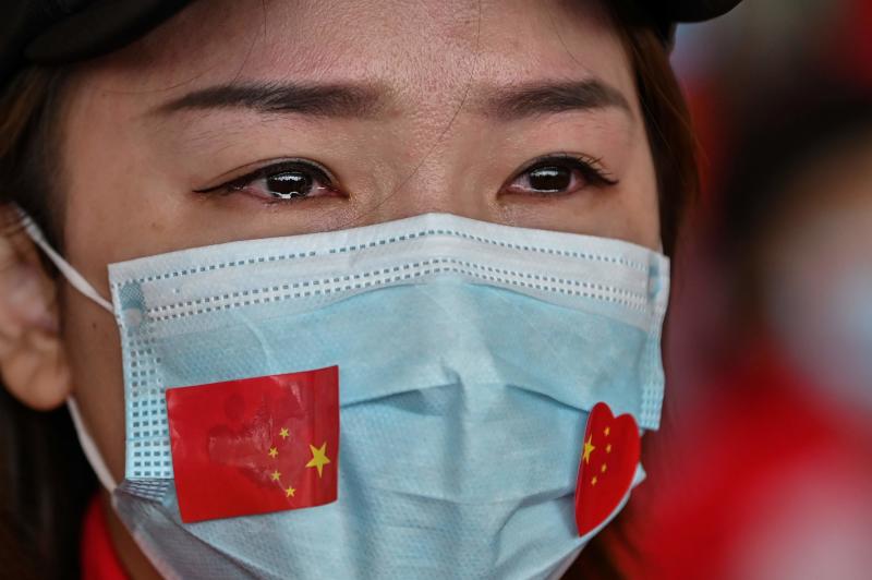 Asia virus latest: China city in lockdown, Seoul sees test surge