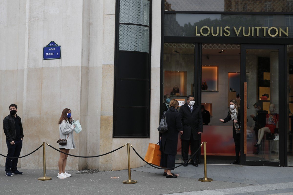 Luxury stores open in Paris that’s empty of tourists as France eases coronavirus lockdown restrictions