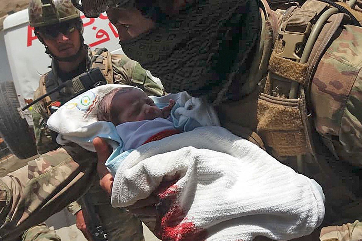 ‘Total panic’: newborn babies among at least 16 killed after gunmen attack Afghanistan hospital