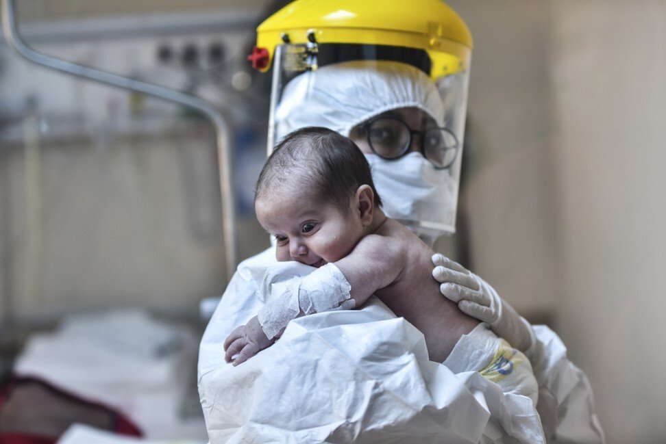 Finding source of coronavirus will help uncover how Covid-19 ‘invaded human species’, WHO official says