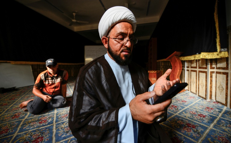 In virus-hit Iraq, shrine visits go virtual