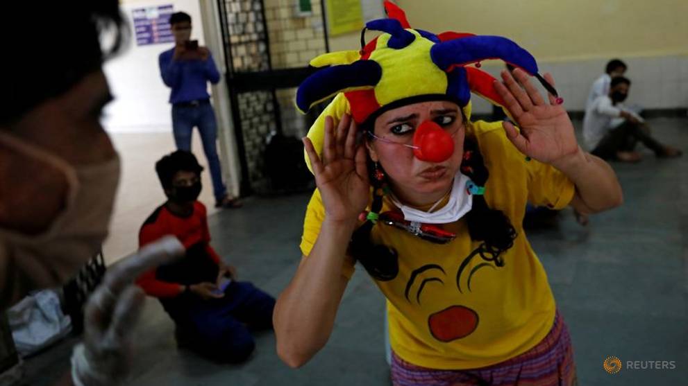 COVID-19: Clowns visit Indian shelters, briefly giving stranded migrants a laugh