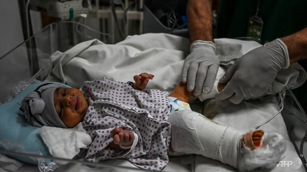 'We cut the cord with our bare hands': Mother gives birth during gun attack at Kabul hospital