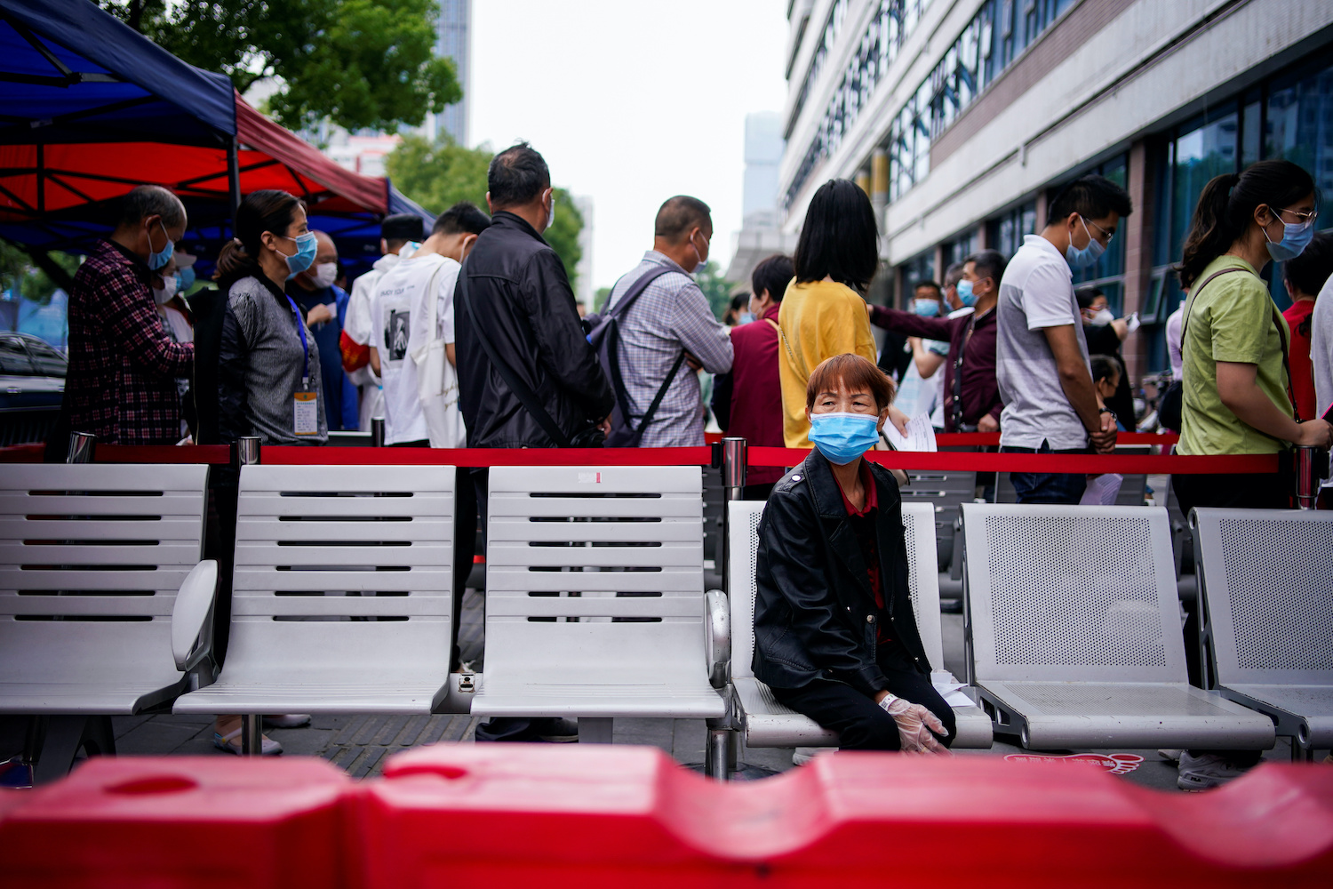 Wary Wuhan residents back new testing blitz