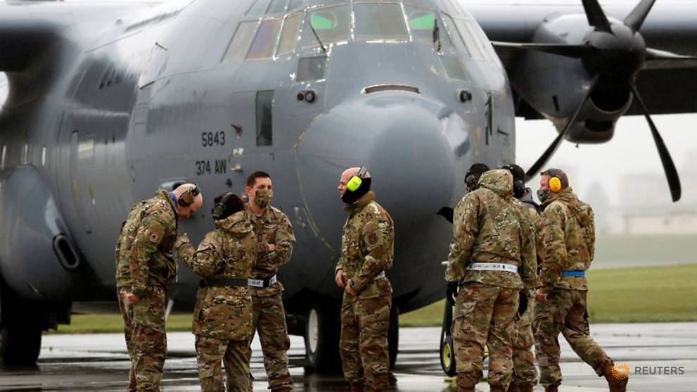 US masses planes at Japan base to show it can handle COVID-19