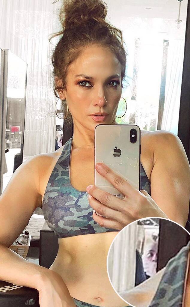 Mystery Solved: Here's Who Is Behind Jennifer Lopez In That Eyebrow-Raising Selfie