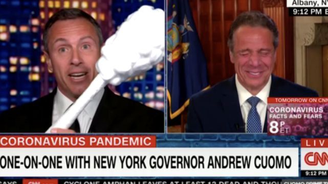 Chris cuomo swabs brother Andrew cuomo with absurd coronavirus props