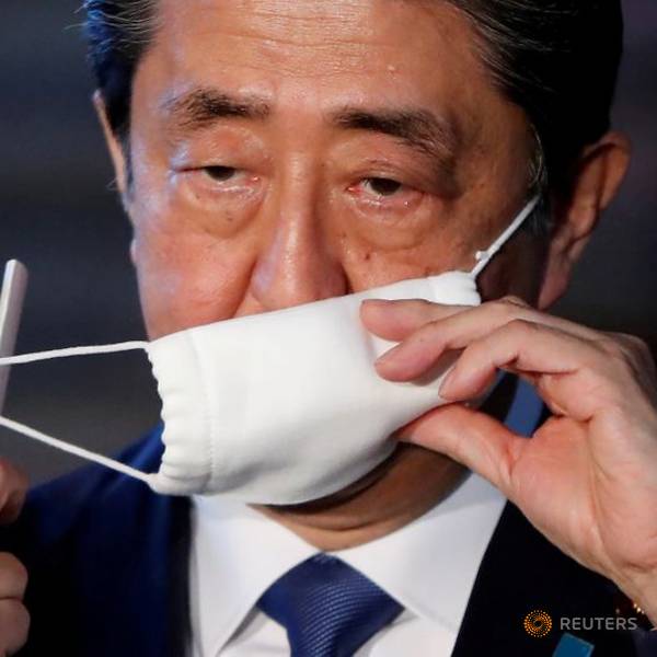 Rare online outrage in Japan forces Abe to delay controversial bill