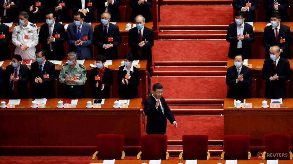 China omits GDP goal, pledges higher spending