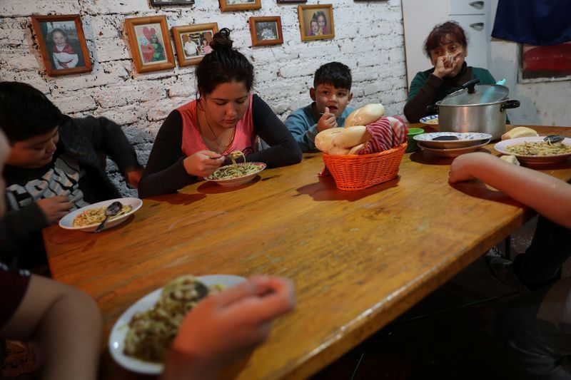 Chileans rediscover community kitchens as coronavirus, and hunger, bite