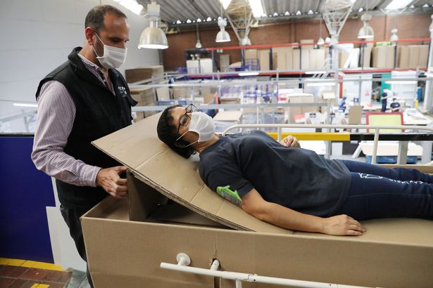 Cardboard hospital bed transforms into coffin when coronavirus patients die