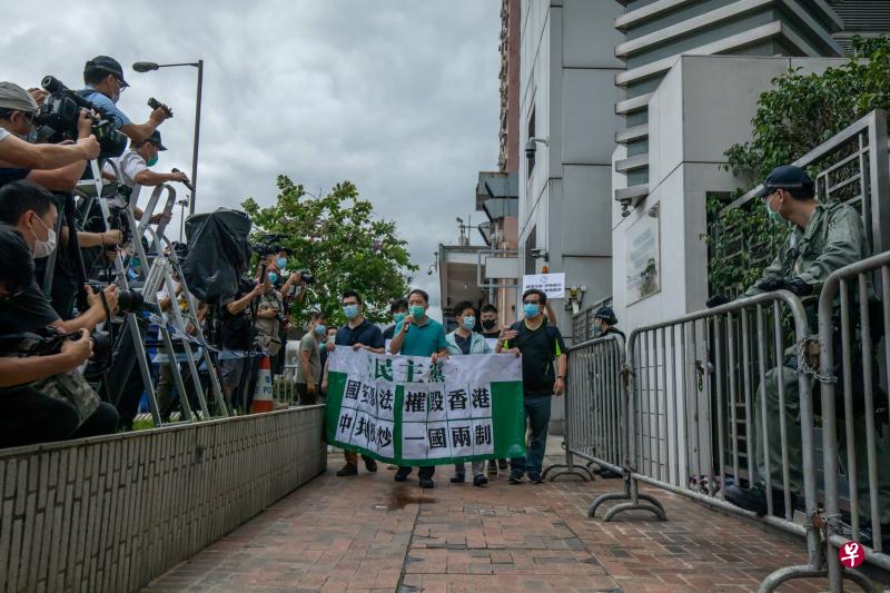 指北京力图“一国一制” 香港泛民号召大规模示威