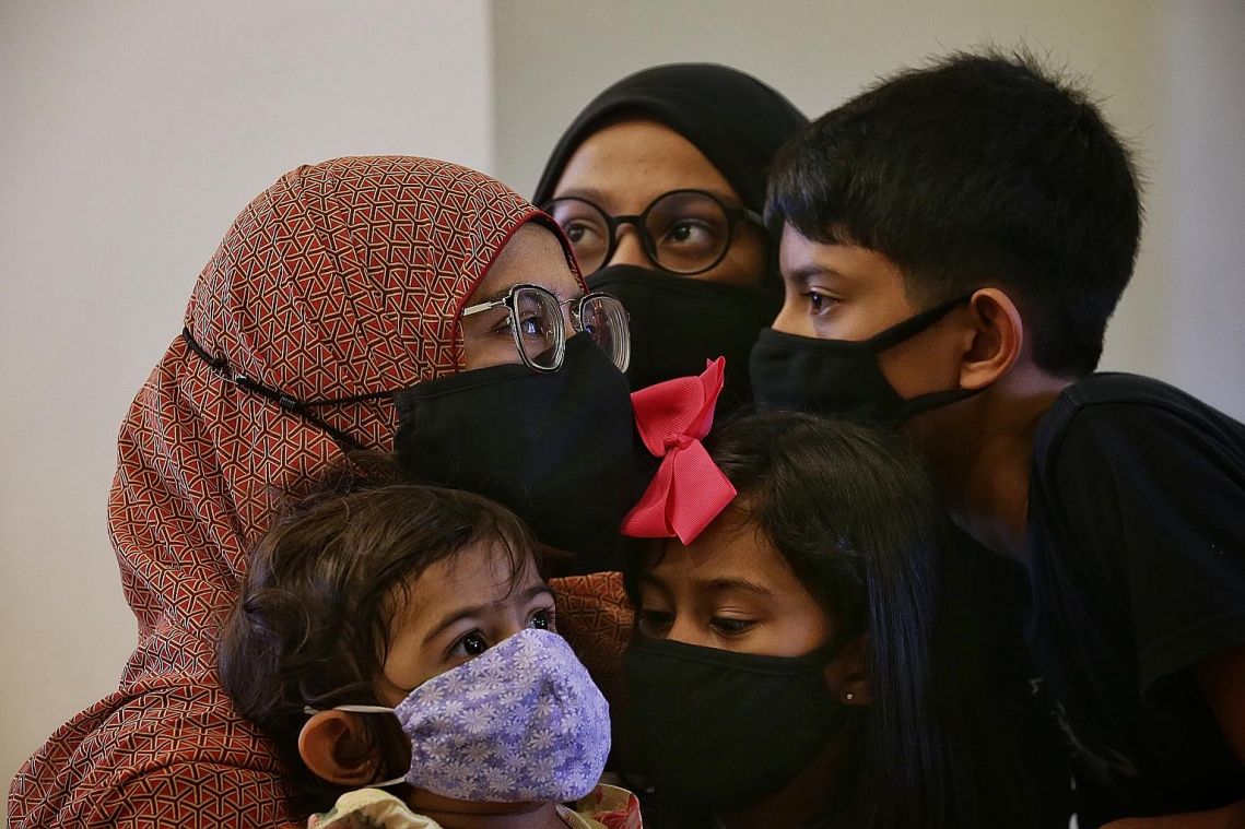 Family of six who caught virus are reunited after ordeal