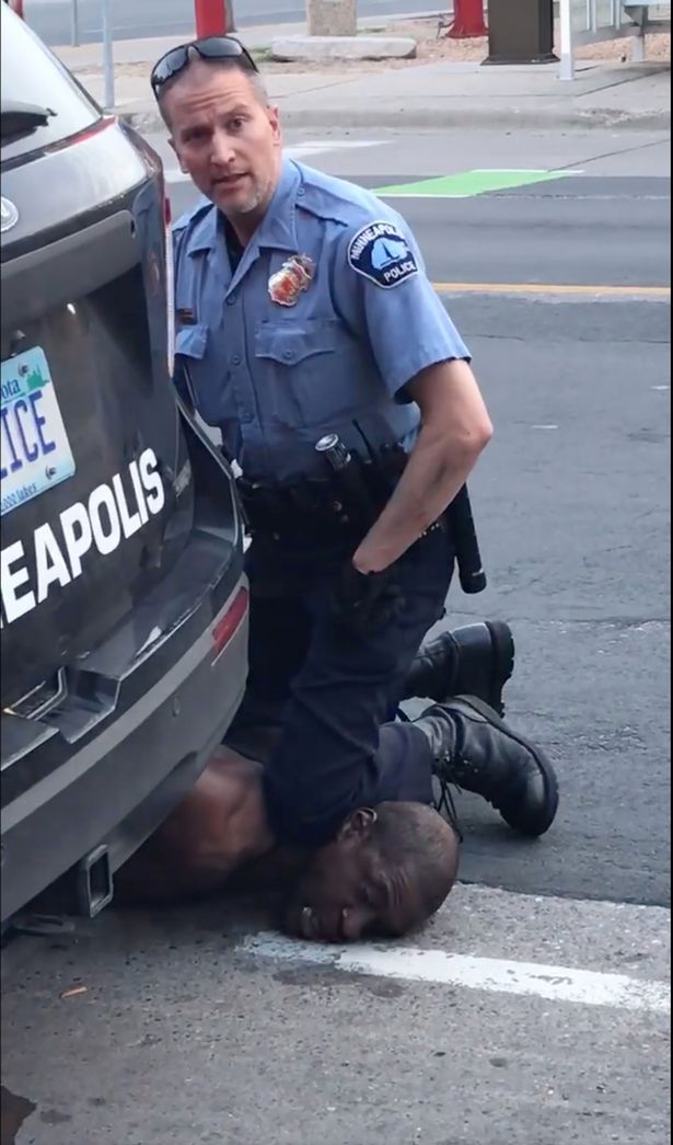 New video shows George Floyd not resisting arrest as officers drag him from car