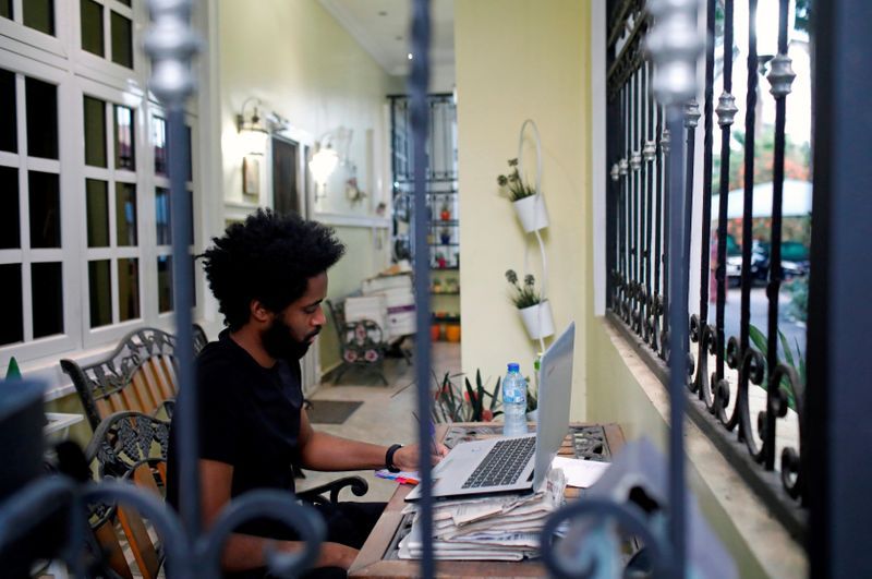 Looking in, looking out: world emerges from lockdown with mixed feelings