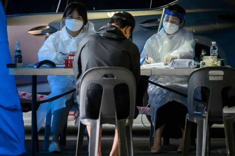South Korea re-imposes some social restrictions to combat new virus cases