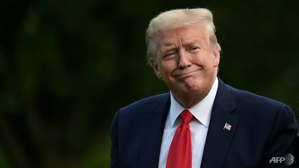 Trump signs order targeting social media after tweets flagged