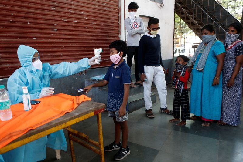 India posts record jump in covid-19 cases, modi says 'long battle' ahead