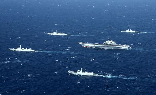 US warship challenges Beijing’s South China Sea claims with latest show of military might