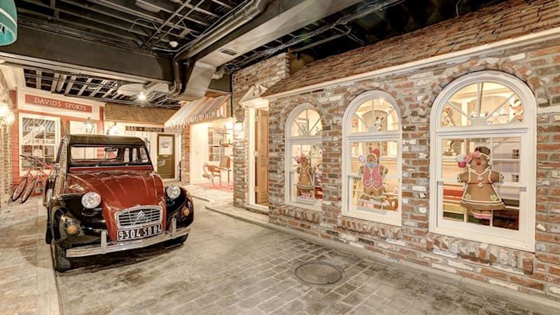 $4.5M Maryland mansion has a brick street with classic cars in its basement