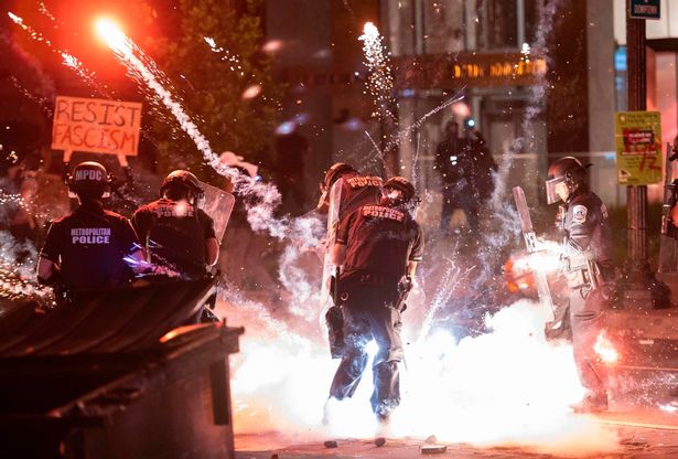 Donald Trump threatens to deploy US military to stop protesters if cities don't act