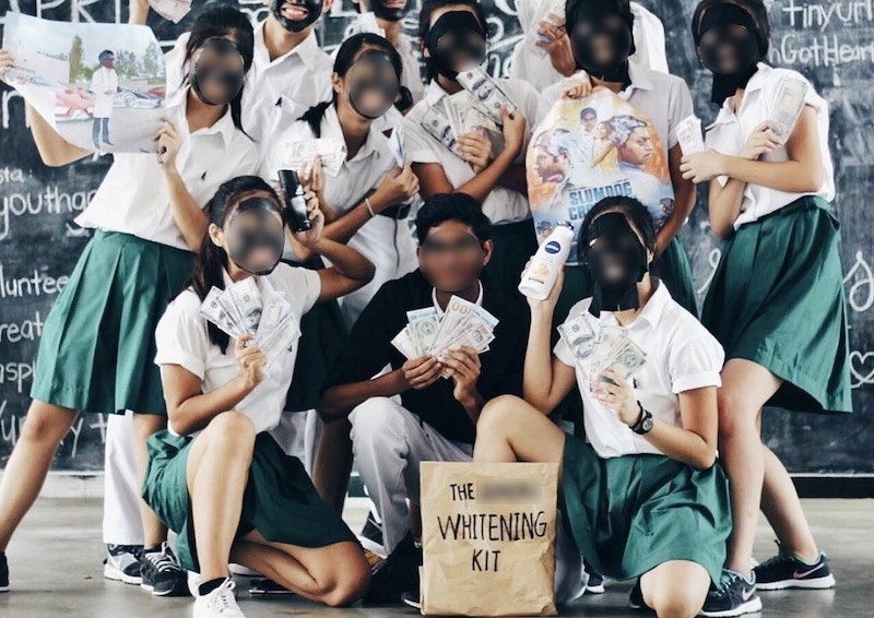 Ten RI students who painted their faces black apologise for their behaviour