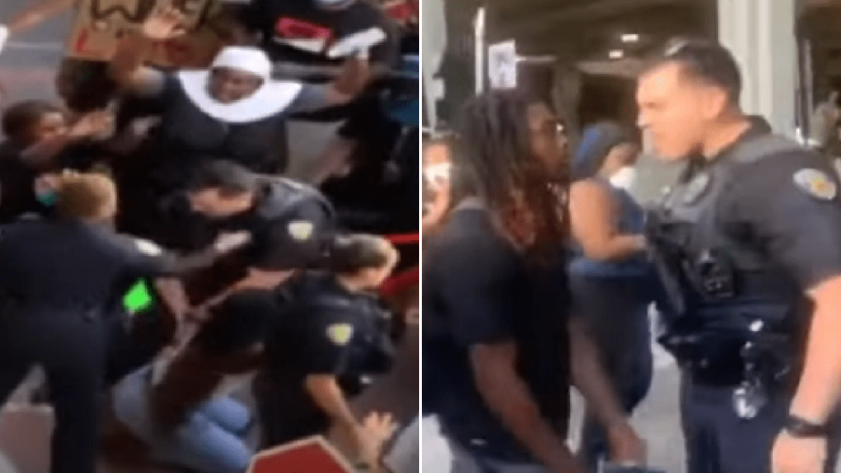 Police officer suspended for pushing black woman as she knelt in peaceful protest