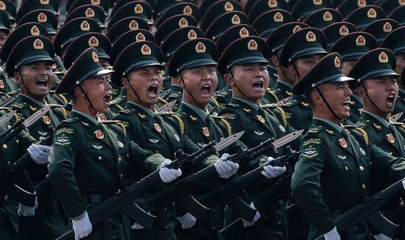 Fears of total war as China repeats threat to INVADE neighbouring Taiwan