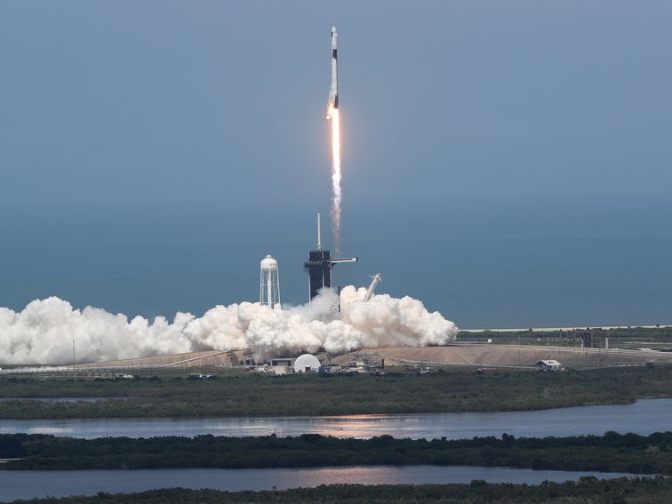 Scenes of SpaceX launching NASA astronauts into orbit, moment by moment