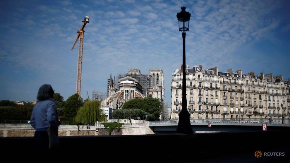 Notre-Dame workers start removal of fire-damaged scaffolding