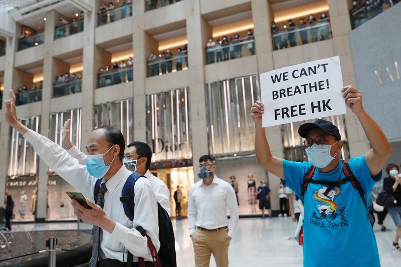A year on, Hong Kong democracy protesters torn between hope and fear
