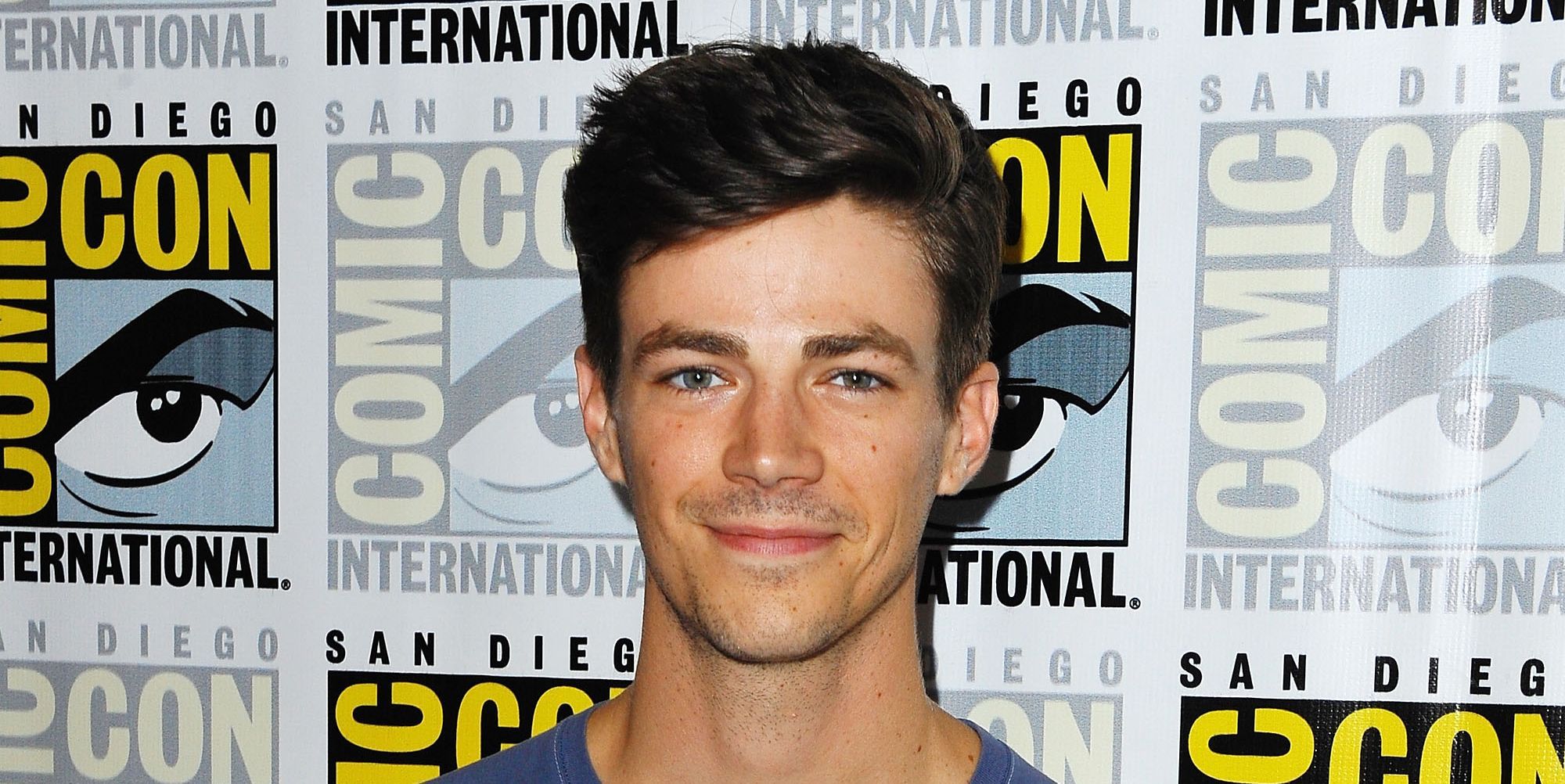 The Flash S Grant Gustin Reacts To Co Star S Firing For Racist And