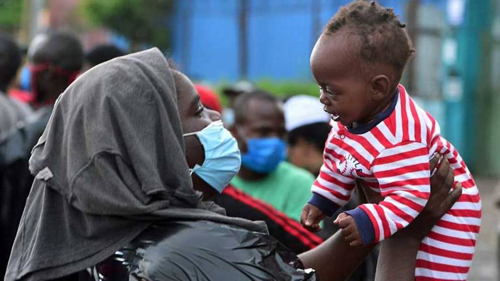 WHO says pandemic 'far from over' as daily cases hit record high